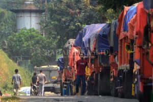 Tambah Alat Berat TPA