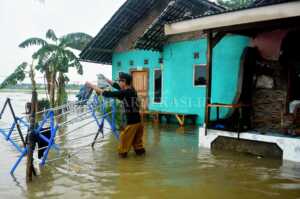 Perbaikan Rumah akibat Longsor, Terkendala Tanggul