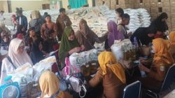 Ribuan Warga Rawalumbu Terima Dua Karung Beras